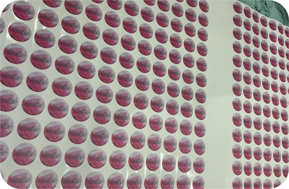 Impresión de pegatinas redondas rosas en pliego